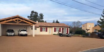 Réalisation d'un parking empierré de 400m² sur la commune de Técou dans le Tarn par l'entreprise M2 Diffusion.